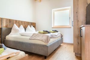 Posteľ alebo postele v izbe v ubytovaní Appartement Bergpanorama Brandegg