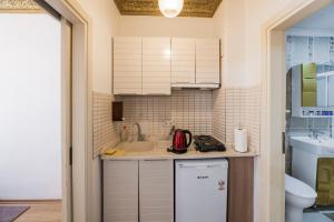 A cozinha ou cozinha compacta de Punto Suite