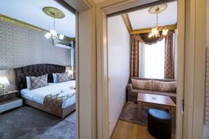 Cama ou camas em um quarto em Punto Suite