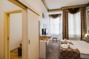 Cama ou camas em um quarto em Punto Suite