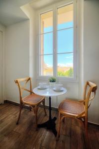 Posedenie v ubytovaní IMMOGROOM-Suquet-AC-WIFI-close to the beaches