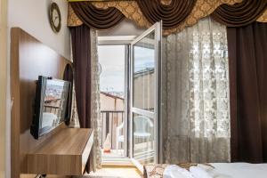 Cama ou camas em um quarto em Punto Suite
