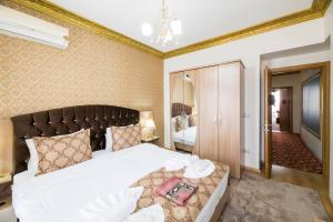 Cama ou camas em um quarto em Punto Suite