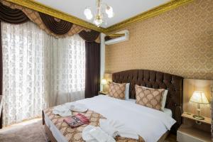 Cama ou camas em um quarto em Punto Suite