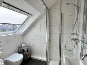 Koupelna v ubytování Haus Brandes + 19 fotografií