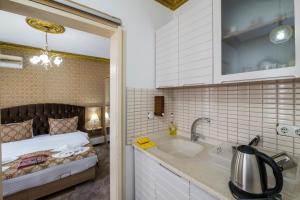 A cozinha ou cozinha compacta de Punto Suite