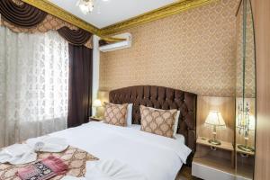 Cama ou camas em um quarto em Punto Suite