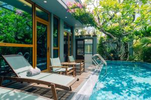 Басейн в CHiEM HoiAn - The Beachside Boutique Hotel & Villa або поблизу