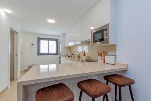 Kuchyň nebo kuchyňský kout v ubytování PANORAMIC private pool home