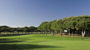 a golf course with trees and a green field at Hello Chloé in Vilamoura