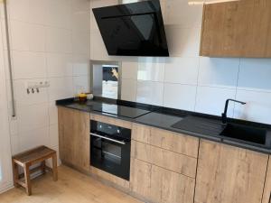 Kuchyňa alebo kuchynka v ubytovaní La Pau Apartaments
