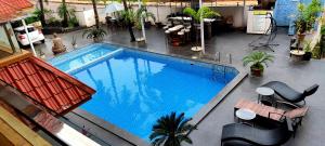 Bazén v ubytování Hotel Goa Continental - Baga nebo v jeho okolí