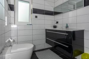 Koupelna v ubytování Apartments Marija