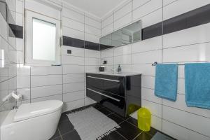 Koupelna v ubytování Apartments Marija