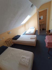 Katil atau katil-katil dalam bilik di Chez Marie et Didier Chalet saint Jacques