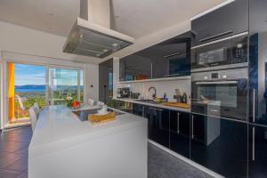 Kuchyň nebo kuchyňský kout v ubytování Apartments Marija
