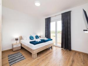 Postel nebo postele na pokoji v ubytování Guest House Mistral