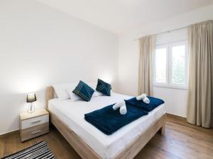 Postel nebo postele na pokoji v ubytování Guest House Mistral