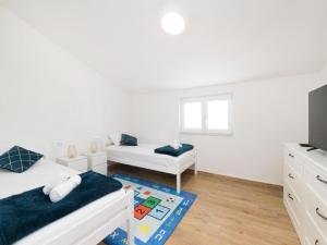 TV a/nebo společenská místnost v ubytování Guest House Mistral