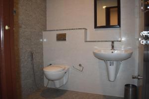 Koupelna v ubytování Hotel UR Comforts Jayanagar