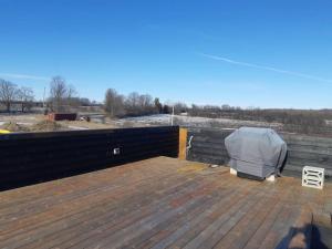 a roof with a mattress on top of it at Hygge House Cozy Boutique Guest House in Hillier