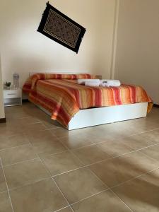 Postel nebo postele na pokoji v ubytování Bianco dormire