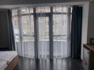 Voodi või voodid majutusasutuse Friendly Hotel toas