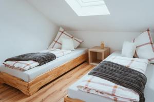 Un pat sau paturi într-o cameră la Kleine Auszeit