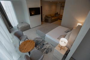 Кровать или кровати в номере Marine Residence Sea View