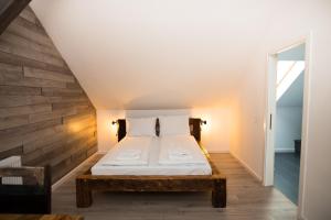 Un pat sau paturi într-o cameră la Kata - Lak