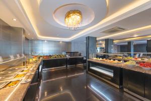 a buffet line with many different types of food at Club Viva Hotel in Marmaris