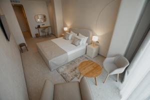 Кровать или кровати в номере Marine Residence Sea View