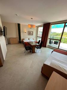 A television and/or entertainment centre at Briz Beach apartments - section B