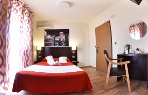 Postel nebo postele na pokoji v ubytování Hotel Zen Airport