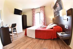 Postel nebo postele na pokoji v ubytování Hotel Zen Airport