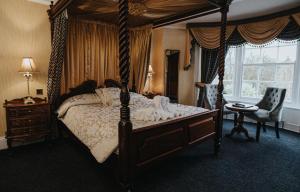 Letto o letti in una camera di Kings Croft Hotel