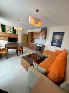A seating area at Briz Beach apartments - section B
