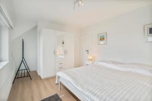 Postel nebo postele na pokoji v ubytování maison des dunes