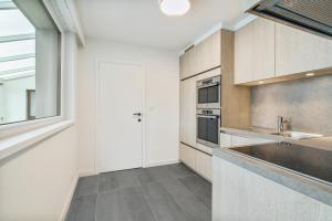 Kuchyň nebo kuchyňský kout v ubytování maison des dunes