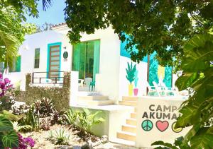 Zahrada ubytování CAMP AKUMAL - Hosted Family Bungalows
