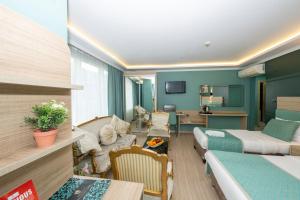 Postel nebo postele na pokoji v ubytování The Hotel Ottoman City Istanbul