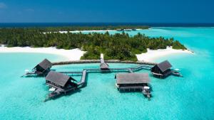 an aerial view of an island in the ocean at One&Only Reethi Rah in Reethi Rah