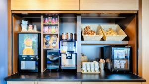 Kuchyň nebo kuchyňský kout v ubytování B&B Hotel München-Garching