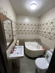 Koupelna v ubytování Khamza Hostel