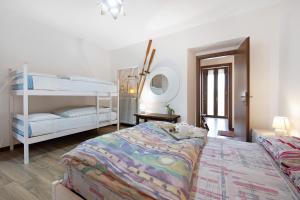Postel nebo postele na pokoji v ubytování Cascina Nonna Nina