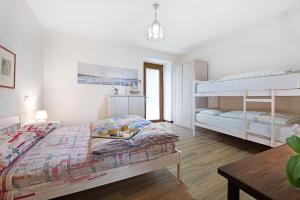 Postel nebo postele na pokoji v ubytování Cascina Nonna Nina