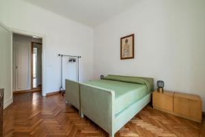 Postelja oz. postelje v sobi nastanitve Sapienza & Villa Borghese Comfy Apartment