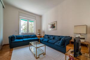 Et opholdsområde på Sapienza & Villa Borghese Comfy Apartment