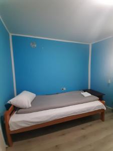 Postel nebo postele na pokoji v ubytování Apartman TATTOO R LUX