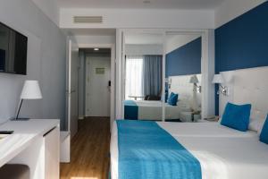Cama ou camas em um quarto em Alexandre Grand Teguise Playa